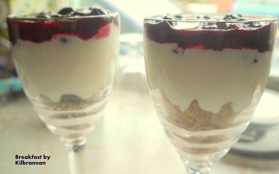 photo of two kilbrannan specials with layers of fruit compote, plain yoghurt and muesli
